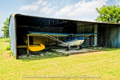 The Flying Tiger Airport & Flight Museum in Paris, Texas was once housed a great collection of retired old war birds and few other air planes. Years ago the owner closed the airport and museum  down and eventually sold or returned them to their owners.